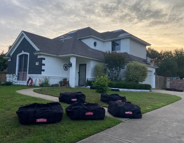 Dark asphalt shingle roof replacement