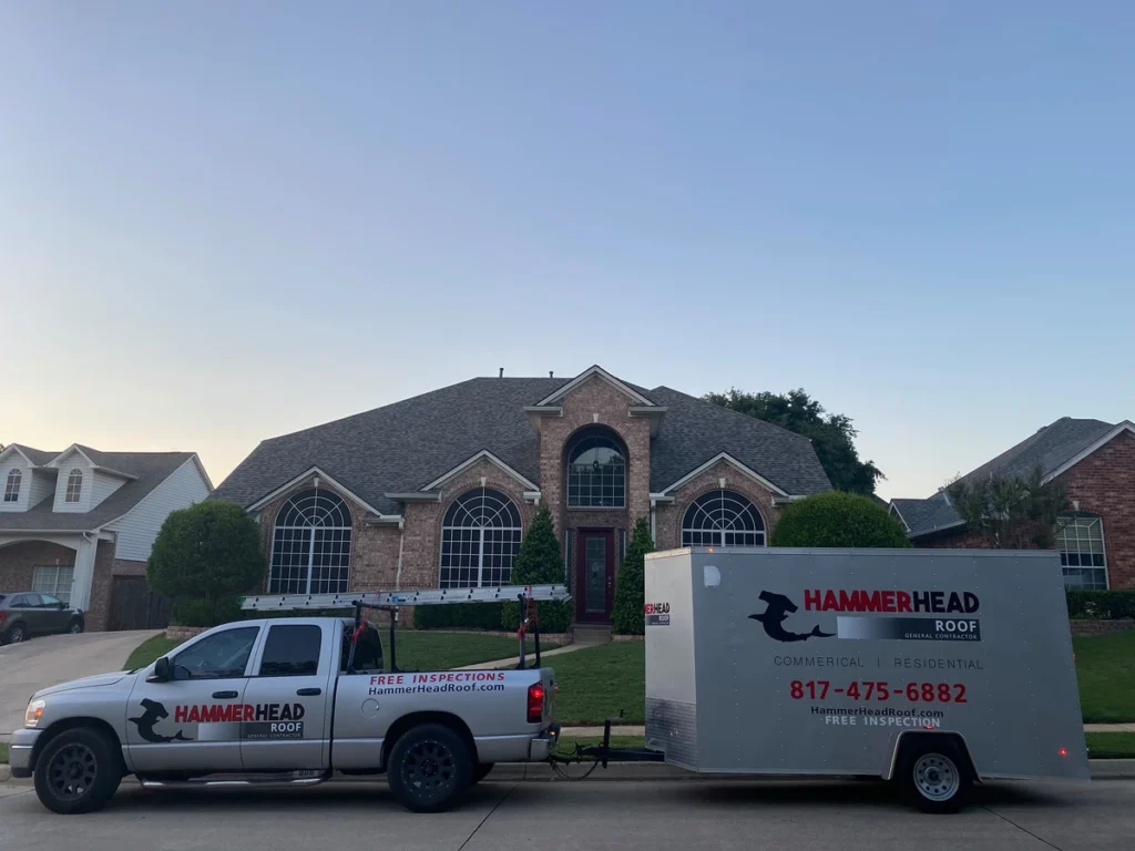 roofing truck front of residential home